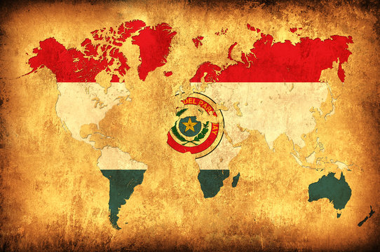 The flag of Paraguay in the outline of the world map