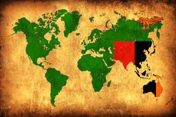 The flag of Zambia in the outline of the world map