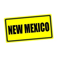 New Mexico back stamp text on yellow background