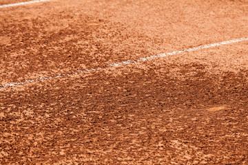 Tennis clay court with details of baselines.