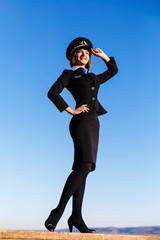 Beautiful young woman stewardess
