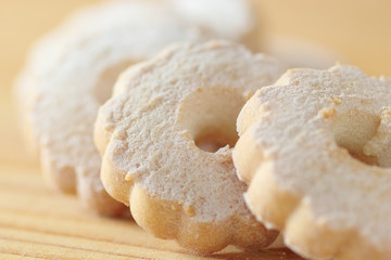 Italian cookies arranged on a wooden table