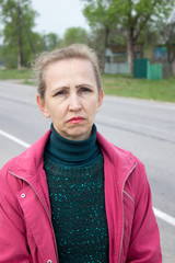 A woman in a red jacket