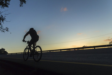 Fototapeta premium Cycling Dawn Road