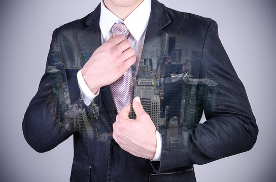 Business people and technology concept - double exposure of businessman over city background