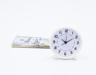 Clock and dollar bill for money and time concept