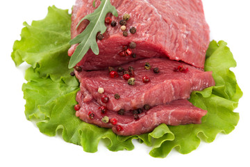 Fresh raw meat on a white background.