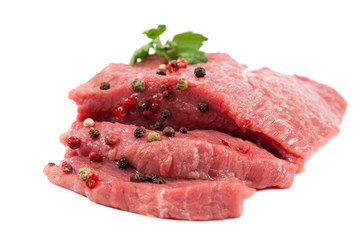 Fresh raw meat on a white background.