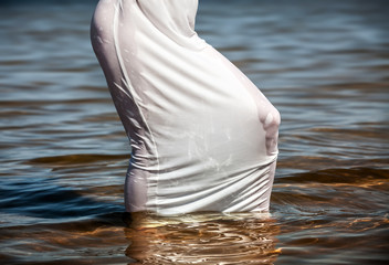 woman in wet white dress