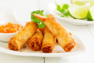 Spring rolls with shrimp with sweet chili sauce. Asian cuisine.