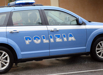 italian blue police car in the road