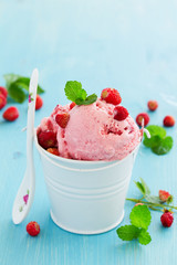 Homemade ice cream with wild strawberry.