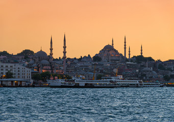 Fototapeta na wymiar Sunset in Istanbul with Blue and New Mosques silhouettes, Turkey