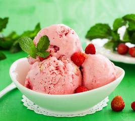 Homemade ice cream with wild strawberry.