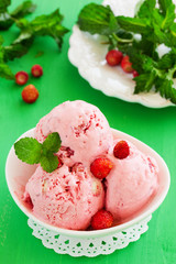 Homemade ice cream with wild strawberry.