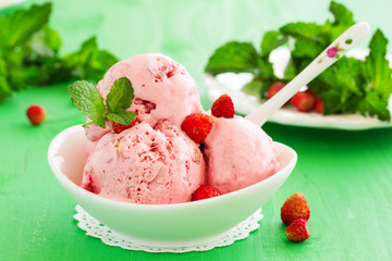 Homemade ice cream with wild strawberry.