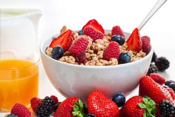 Fruit muesli and fresh orange juice.