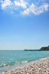 sea, sky and pebble beach