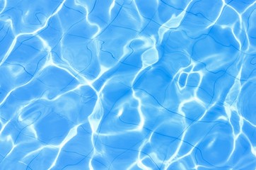 Rippled water in swimming pool / Background 
