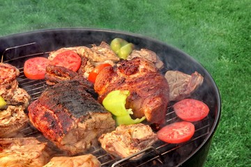 Mixed Meat And Vegetables On The Hot BBQ Grill