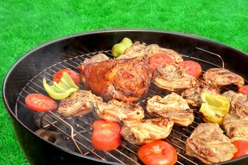 Meat And Vegetables Mix On The Hot BBQ Grill