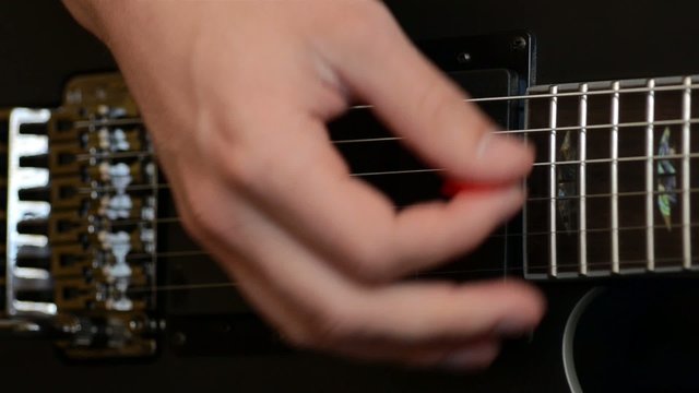 Strumming an Electric Guitar