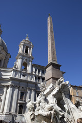 Fototapeta na wymiar Fountain of the Four Rivers (Fontana dei Quattro Fiumi) with an Egyptian obelisk. Italy. Rome. Navon Square (Piazza Navona).