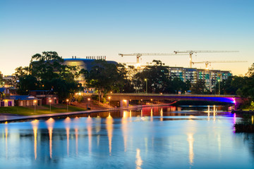 Fototapeta premium SAHMRI and NewRAH at dusk by Torrens River. Very long exposure e