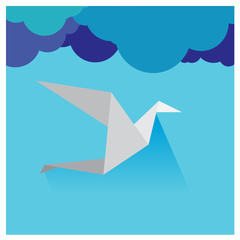 Vector origami birds flying in the sky, a beautiful gray and whi