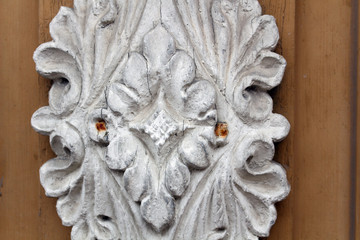 With ornament of entry. Antique ornament. Luxury wooden furniture with natural wood.
