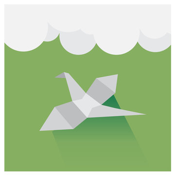 Vector origami birds flying in the sky, a beautiful green and wh