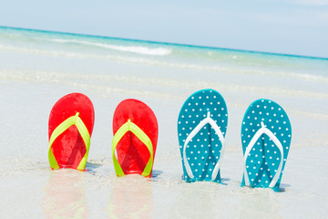 Naklejka premium Beach, slippers on tropical beach