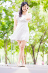 Naklejka premium Portrait beautiful asian woman walking in park