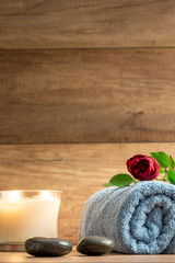 Fototapeta na wymiar Romantic wellness arrangement with a burning candle