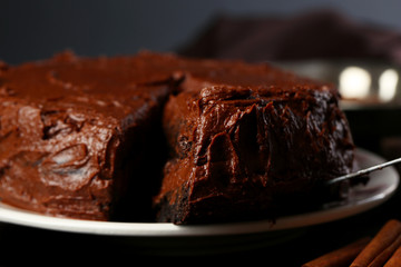 Tasty chocolate cake on table, close-up