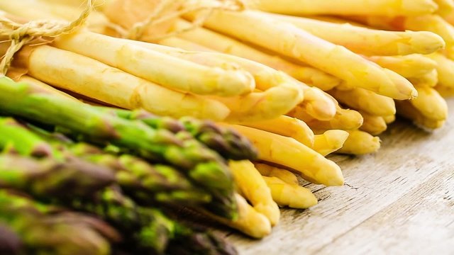 Asparagus - bunches of white and green asparagus 