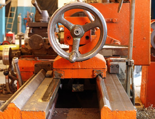Lathe in workshop.