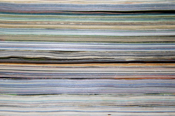 pile of old magazines and books close up