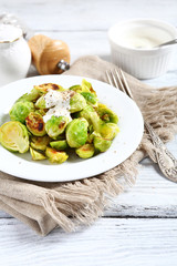 Tasty Brussels sprouts with sauce