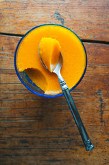 Sea buckthorn jelly in a blue cup