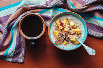 Oatmeal with peaches, flax and maple syrup