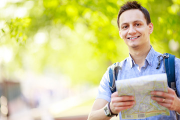 Tourist with map. 