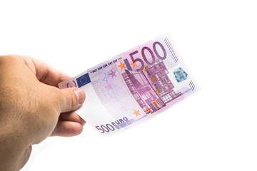 male hand holding 500 euro banknote on white background