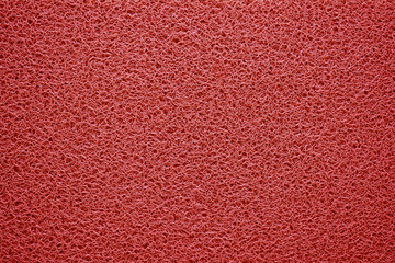 Naklejka premium Red doormat texture background.