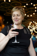 Woman with glass of wine