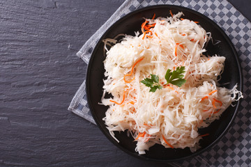 homemade sauerkraut with carrot horizontal top view 
