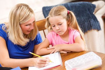 Fototapeta premium Student: Mother Showing Girl How To Complete Problem