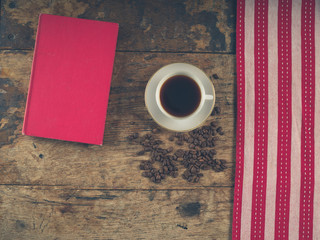 Obraz na płótnie Canvas Coffee concept with cup and book