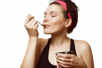 woman eating a delicious ice cream with chocolate - 84533961