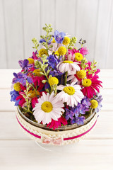Fototapeta na wymiar Table floral arrangement with gerbera flowers